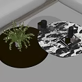 Round Wooden And Marble Coffee Tables With Plant Decor In Living Room