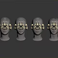 Four Human Head Models Wearing Gold And Green Mechanical Headgear On Reflective Surface
