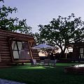Wooden Cabins in Scenic Setting With Green Grass Trees and Outdoor Chairs