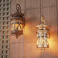 Illuminated Brass and Bronze Wall Lamps with Glass Shades on Wooden Wall