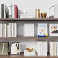Modern Bookshelf Display With Art Books Golden Bowls And Decor Items