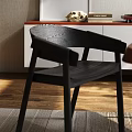 Modern Indoor Table And Chairs With Wooden Top Black Seats Wall Art And Plant