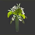 Decorative Plant With White Flowers Green Leaves And Green Berries In Vase