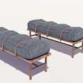 Modern Ottoman Benches With Gray Upholstery Brown Straps And Metal Legs