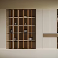 Modern Wall Storage System Featuring Wooden White Shelves And Decorative Books