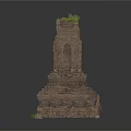 Ancient Stone Tower Structure With Layered Base And Grass On Top