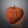 Fresh Red Striped Apple With Brown Stem On Black Reflective Surface