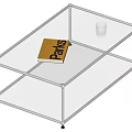 Modern Coffee Table with Transparent Glass Top Metal Frame and Parks Book on Surface