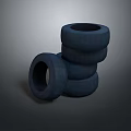Multiple Stacked Black Rubber Tires for Automotive Vehicle Use and Storage