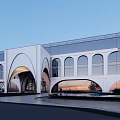 Modern Office Building Exterior With Arched Entrance And Large Glass Facade Design