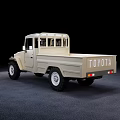 Cream Colored Single Cab Pickup Truck On Black Background And Dark Floor