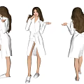 Woman In Elegant White Long Belted Bathrobe Posing Gracefully In Studio