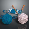 Knitting Supplies With Blue Pink Yarn Balls Wooden Needles And Blue Patterned Fabric