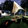 Garden Landscape With Camper Van White Canopy Green Lawn Trees And Outdoor Fire Pit