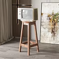 Vintage TV on Wooden Stool in Living Room with Abstract Painting Green Plant and Curtain