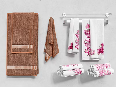 Essential Bathroom Accessories Including Brown Bath Towels White Floral Hand Towels And Towel Rack 3d model