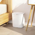Modern Public Facility White Trash Can With Open Lid In Indoor Corner Area