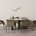 Modern Round White Dining Table Set With Green Chairs And Decorative Plant 3d model