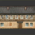 Two Story Residential Building With Brick Exterior Gray Roof Chimneys And White Windows