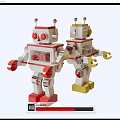Vintage Electric Robot Toys With Red Yellow Accents And Transparent Windows
