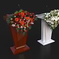 Functional Table with Brown and White Designs Gold Accents and Floral Arrangements