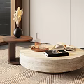 Round Stone Coffee Table With Wooden Side Table Vase Books And Glass In Living Room