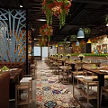 Elegant Restaurant Interior With Hanging Floral Lights Wooden Furniture Round Seating And Colorful Carpet