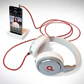 White And Silver Headphones With Red Cable Connected To Smartphone On Stand And Q Logo