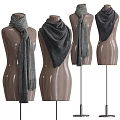 Fashionable Gray Knit Scarves Displayed On Wooden Mannequins With Various Designs