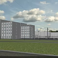 Modern Multistory Industrial Factory Building With Gray Exterior Large Windows Green Lawn And Clear Sky