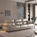 Modern Three Seater Leather Sofa In Interior With Marble Wall Decorative Painting And Green Plant