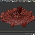 Natural Stone Ringed Campfire Pit With Burning Wood Logs On Sand