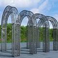 Outdoor Metal Arched Pergola With Intricate Patterns And Green Trees Background