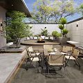 Outdoor Courtyard Garden With Fire Pit Seating Area Wooden Table And Green Plants