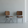 Stylish Dining Chairs With Woven Backrests Brown Leather Seats Metal Frames and Minimalist Design