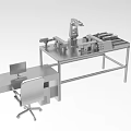 Advanced Industrial Equipment Setup with Robotic Arm Workbench Computer Monitor and Office Chair