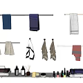 Soft Various Colored Bath Towels Hanging On Rods With Bathroom Toiletries And Accessories