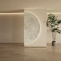 Minimalist Moon Shaped Wall Decor With Surrounding Lighting Beige Wall And Green Plant