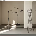 Modern Floor Lamps With Metal Stands And Unique Shade Designs In Minimalist Room
