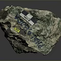 Natural Rough Mineral Stone With Green White Texture And Labeled Tags