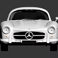 Silver Classic Sports Car With Sleek Body And Vintage Design Elements