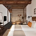 Hotel Guest Room With Twin Beds White Linens Orange Cushions Wooden Ceiling And Minimalist Decor