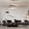 Elegant Modern Living Dining Area With Gray Sofa Round Chandelier Abstract Artwork and Potted Plant