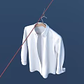White Shirt Hanging on a Hanger Against Dark Blue Background