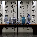 Traditional Chinese Calligraphy Art with Blue and White Porcelain on Wooden Table
