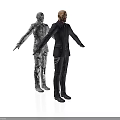 Standing Human Figures With Arms Outstretched Silver Model And Dark Suit Male On White Background