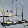 Multi Tiered Metal Rack With Hanging And Arranged Colorful Dinnerware Set