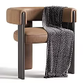 Modern Beige Fabric Upholstered Single Armchair With Sleek Dark Metal Frame And Cozy Throw Blanket