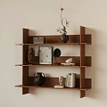 Wooden Wall Mounted Multi Tier Shelf Featuring Decorative Vase Photo Frame And Books