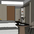 Modern Hotel Room Interior With Comfortable Bed Sofa Round Coffee Table And Decorative Paintings